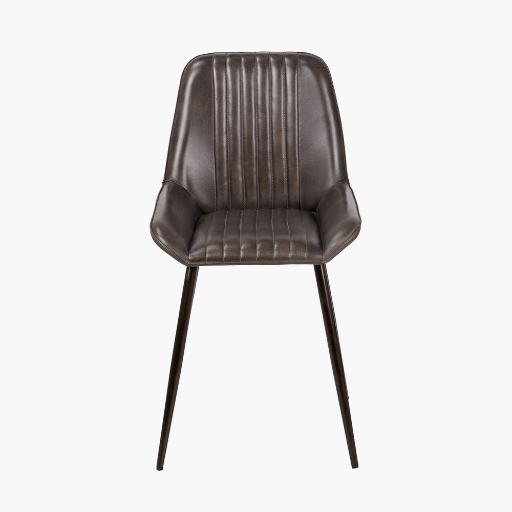 Upholstered in Vintage Dark Brown Leather with ribbed back cushioning. Vintage style and modern functionality. A refined addition to any dining setting or living space. Available today at www.nobleandnook.co.uk