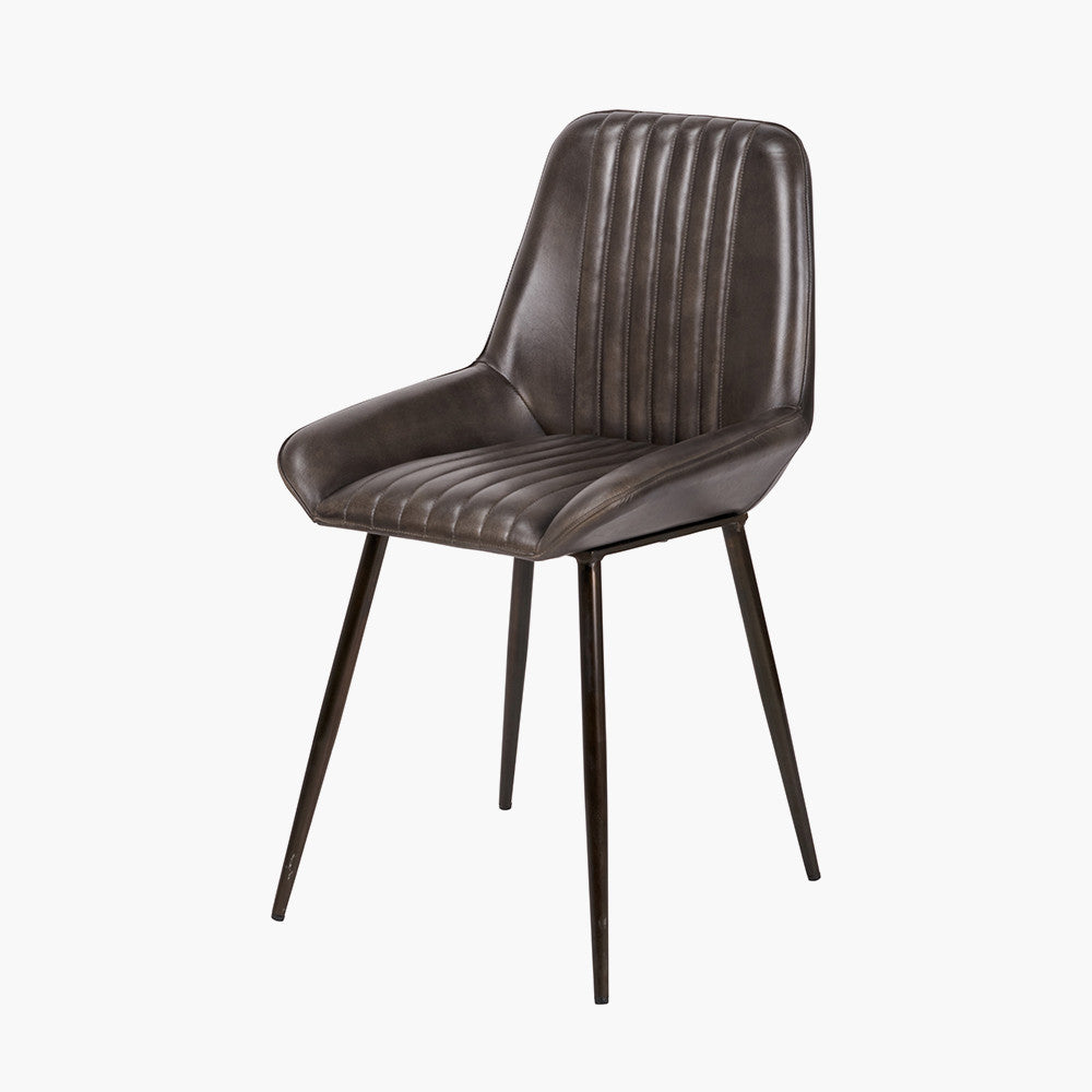 Upholstered in Vintage Dark Brown Leather with ribbed back cushioning. Vintage style and modern functionality. A refined addition to any dining setting or living space. Available today at www.nobleandnook.co.uk