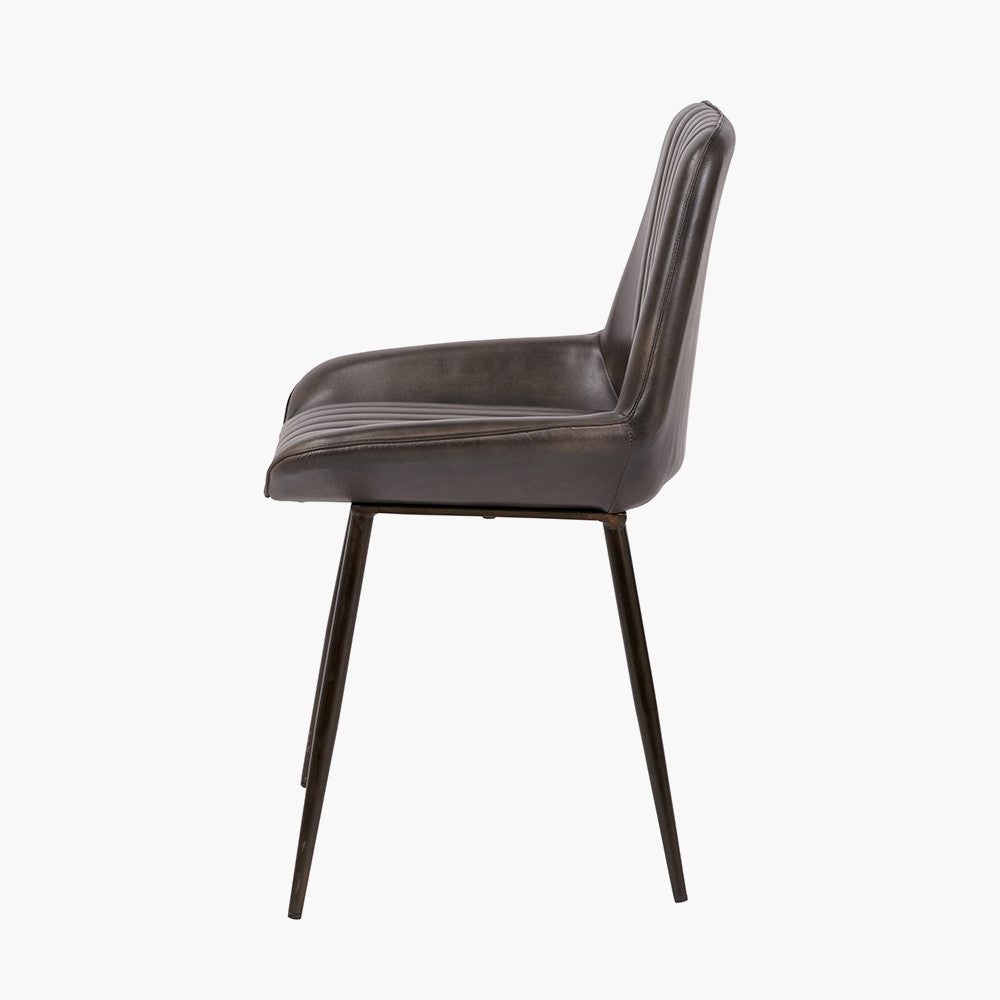 Upholstered in Vintage Dark Brown Leather with ribbed back cushioning. Vintage style and modern functionality. A refined addition to any dining setting or living space. Available today at www.nobleandnook.co.uk