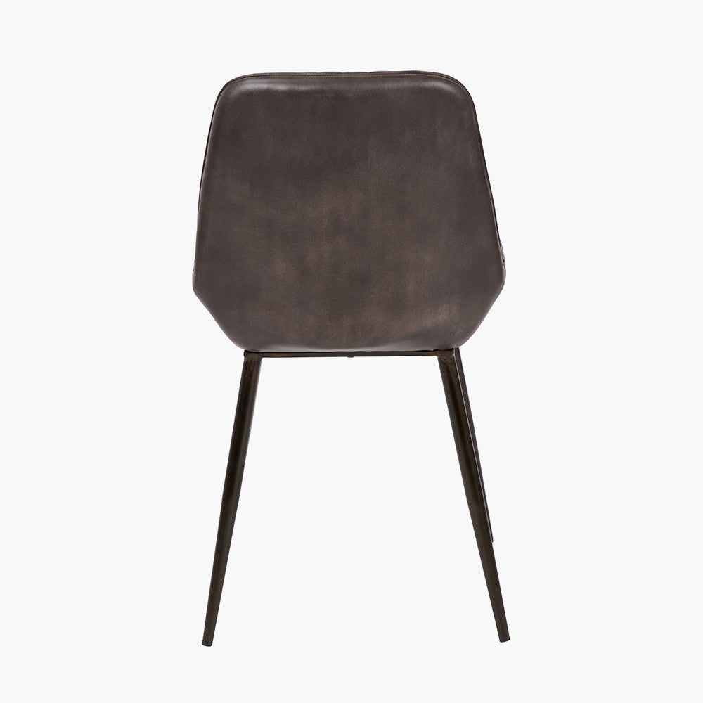 Upholstered in Vintage Dark Brown Leather with ribbed back cushioning. Vintage style and modern functionality. A refined addition to any dining setting or living space. Available today at www.nobleandnook.co.uk