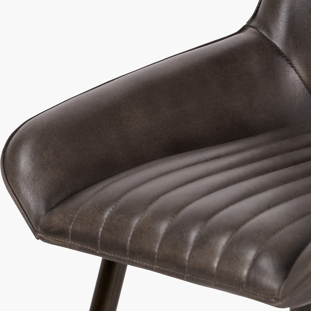 Upholstered in Vintage Dark Brown Leather with ribbed back cushioning. Vintage style and modern functionality. A refined addition to any dining setting or living space. Available today at www.nobleandnook.co.uk