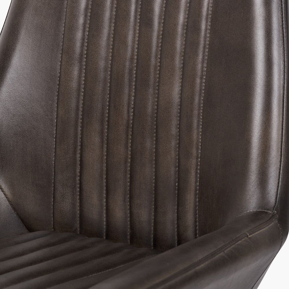Upholstered in Vintage Dark Brown Leather with ribbed back cushioning. Vintage style and modern functionality. A refined addition to any dining setting or living space. Available today at www.nobleandnook.co.uk