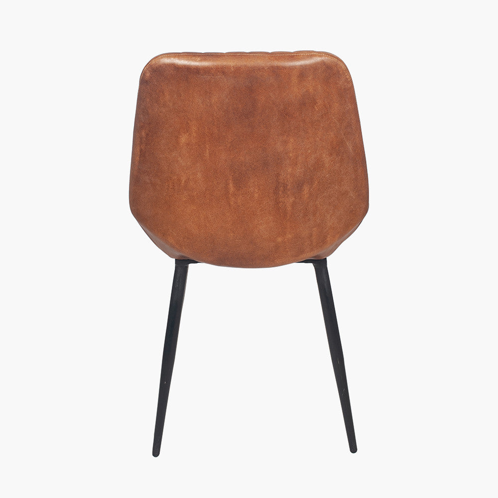 Upholstered in Vintage Brown Leather with ribbed back cushioning. Vintage style and modern functionality. A refined addition to any dining setting or living space. Available today at www.nobleandnook.co.uk