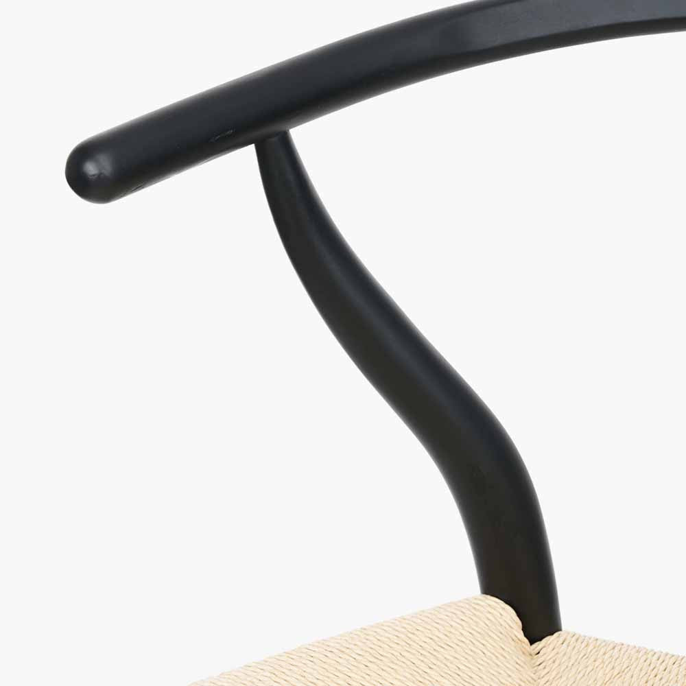 Shop the Quinn Dining Chair with the woven natural paper rope seat and finished in a contemporary black colour. Shop online now at www.nobleandnook.co.uk