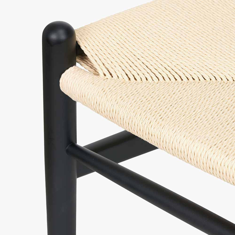 Shop the Quinn Dining Chair with the woven natural paper rope seat and finished in a contemporary black colour. Shop online now at www.nobleandnook.co.uk