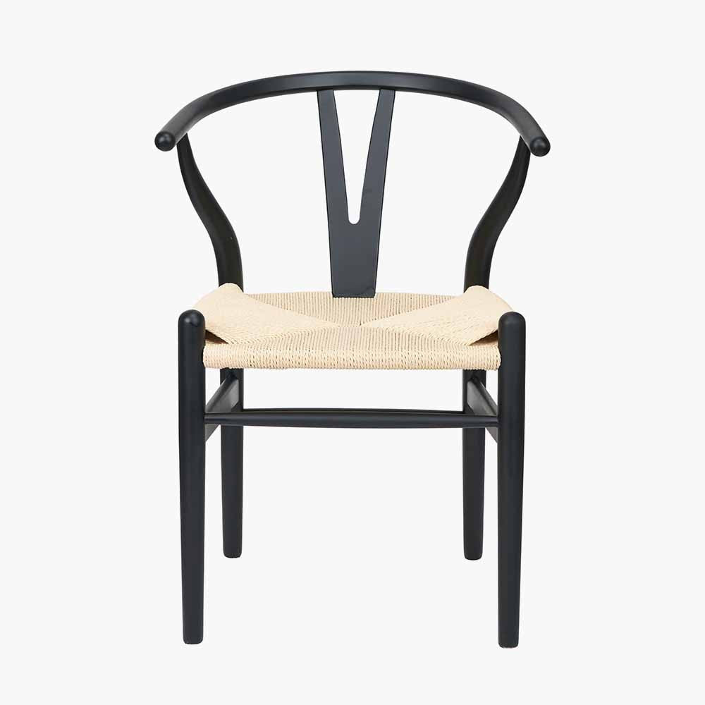 Shop the Quinn Dining Chair with the woven natural paper rope seat and finished in a contemporary black colour. Shop online now at www.nobleandnook.co.uk