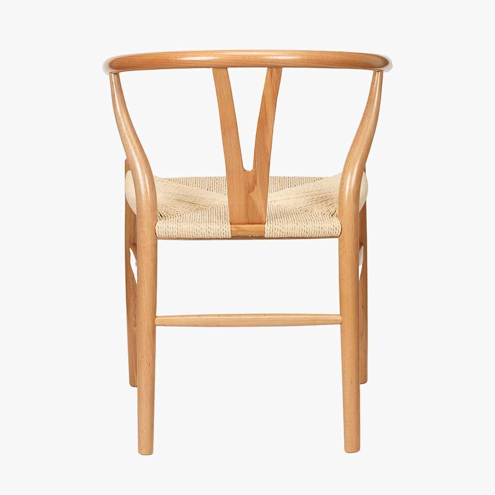 Shop the Quinn Dining Chair crafted from beech wood and finished in beautiful natural hue with a woven natural rope seat. Shop online now at www.nobleandnook.co.uk