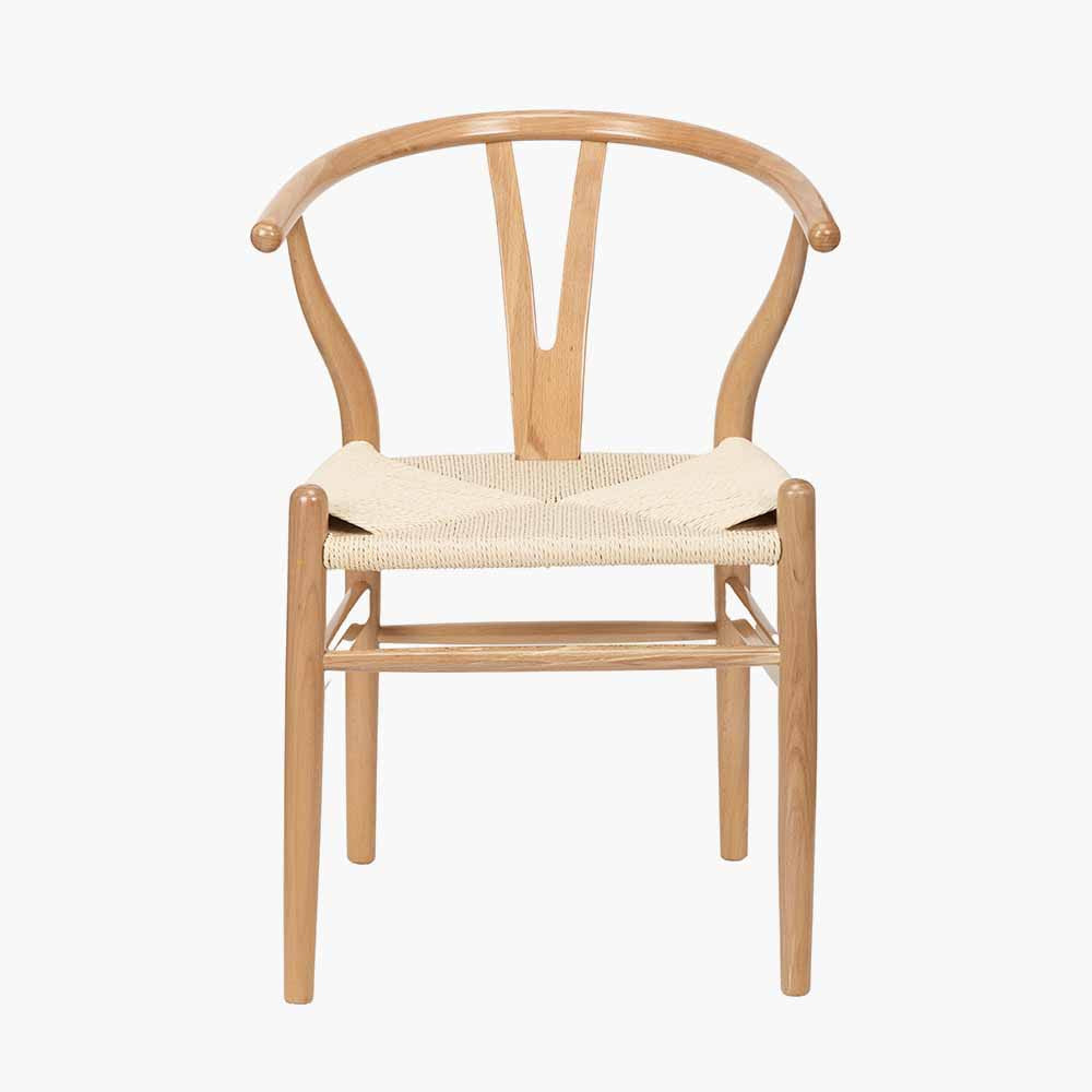 Shop the Quinn Dining Chair crafted from beech wood and finished in beautiful natural hue with a woven natural rope seat. Shop online now at www.nobleandnook.co.uk