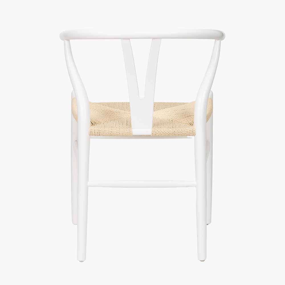 Shop the Quinn Dining Chair, expertly crafted from beech wood and finished in sleek Scandi style white by Pacific Lifestyle. Shop online now at www.nobleandnook.co.uk