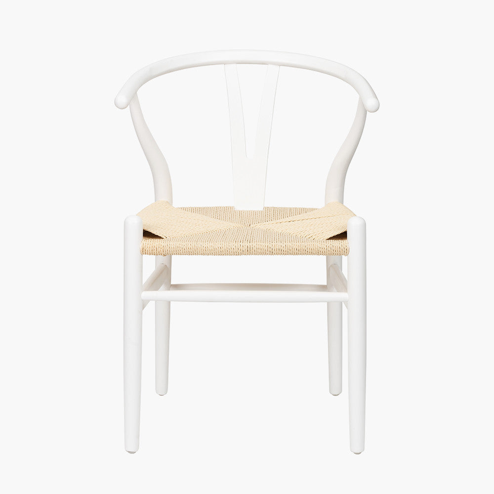 Shop the Quinn Dining Chair, expertly crafted from beech wood and finished in sleek Scandi style white by Pacific Lifestyle. Shop online now at www.nobleandnook.co.uk