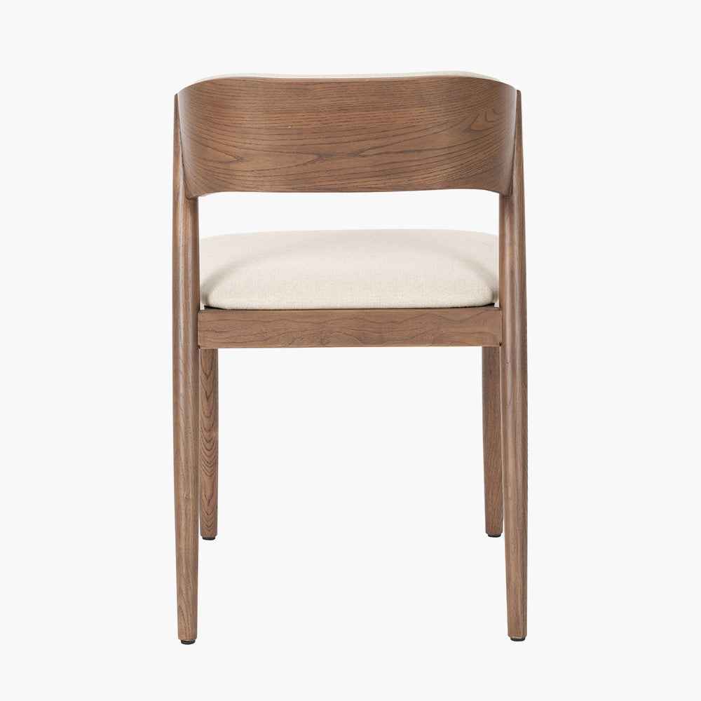Shop the Elias Dining Table and 6 matching Chairs, blending minimalist elegance with Scandinavian-inspired design. Expertly crafted from solid ash wood with a stylish on-trend dark finish. Shop online today at www.nobleandnook.co.uk