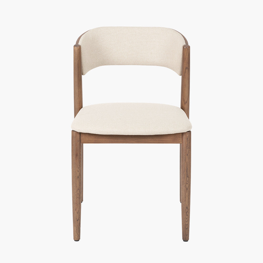 Shop the Elias Dining Table and 6 matching Chairs, blending minimalist elegance with Scandinavian-inspired design. Expertly crafted from solid ash wood with a stylish on-trend dark finish. Shop online today at www.nobleandnook.co.uk