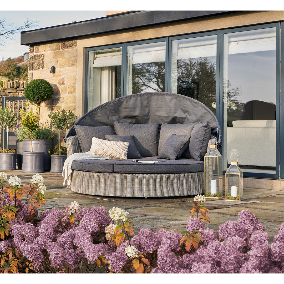 Experience ultimate outdoor luxury with the Bermuda Slate Grey Outdoor Day Bed. Perfect for relaxation and lounging, it elevates your outdoor living space. Shop online at www.nobleandnook.co.uk