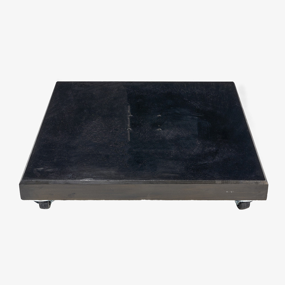 Shop this 90KG parasol base in polished black granite, designed exclusively for use with free arm parasols, it features wheels for easy movement. Shop online today at www.nobleandnook.co.uk