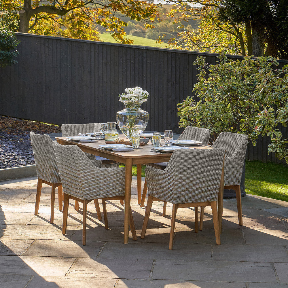 Experience modern al-fresco dining with the Larissa Garden Dining Table and Chairs. Perfect for any outdoor occasion. Shop online today at www.nobleandnook.co.uk