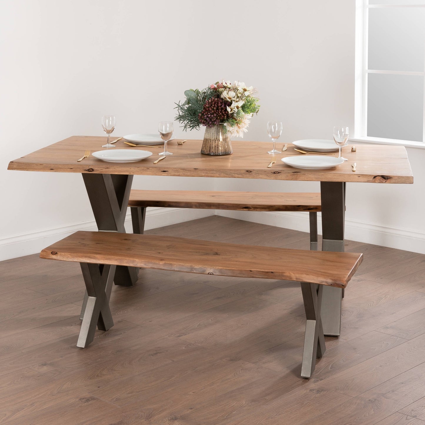 Shop the Live Edge Dining Table combining natural beauty with contemporary handcrafted craftsmanship, featuring a live edge acacia wood top, perfect for family dining. Shop online today at www.nobleandnook.co.uk