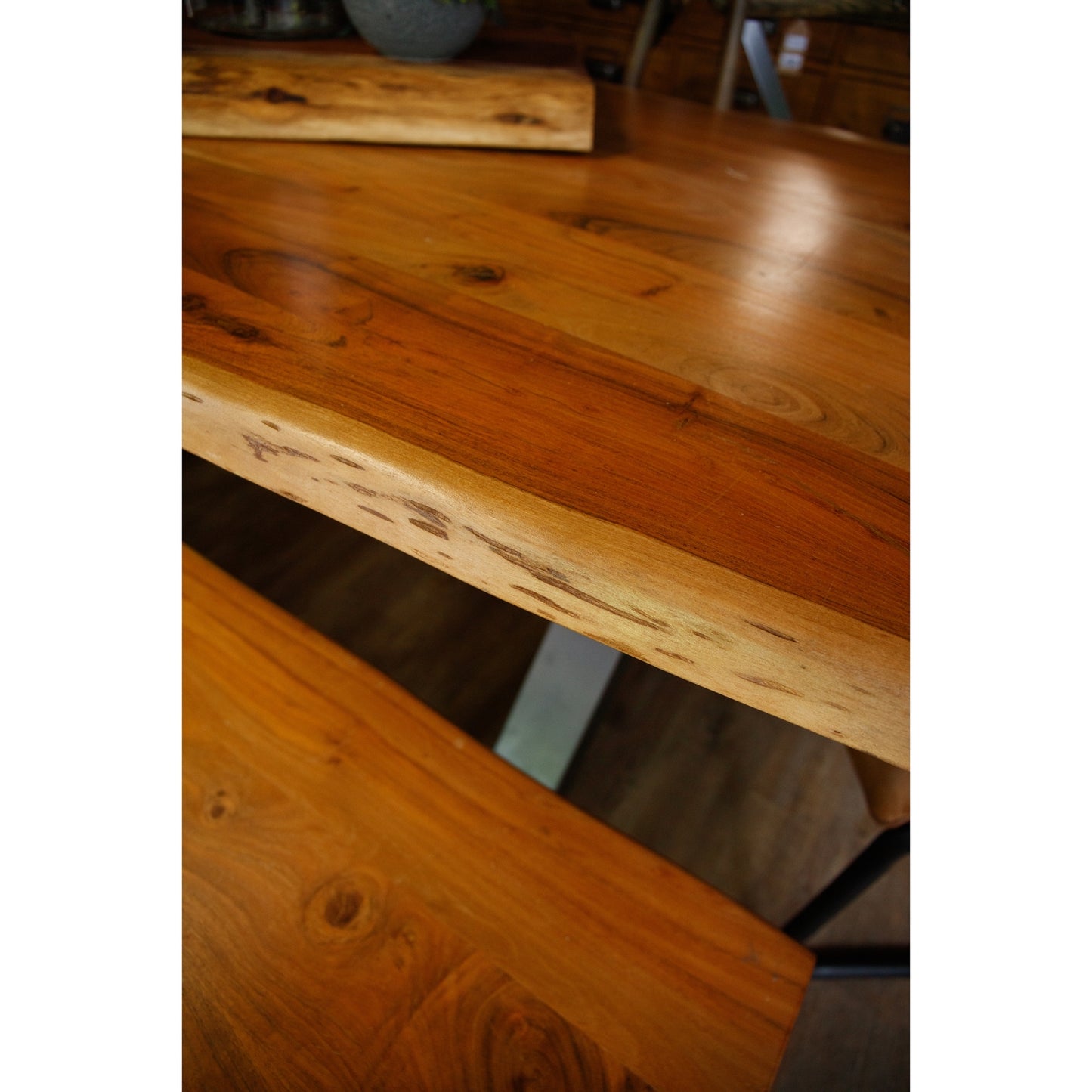 Shop the Live Edge Dining Table combining natural beauty with contemporary handcrafted craftsmanship, featuring a live edge acacia wood top, perfect for family dining. Shop online today at www.nobleandnook.co.uk
