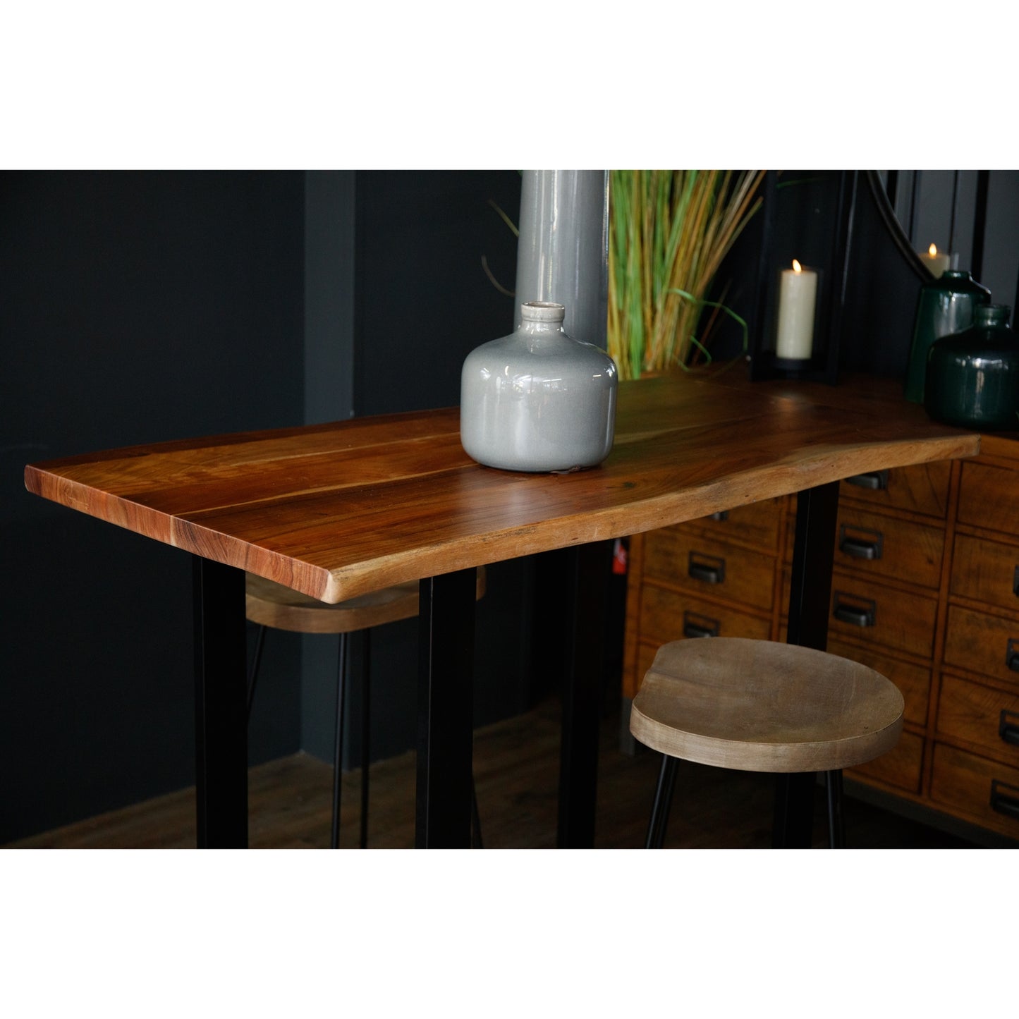 The Live Edge Large Bar Table is a stunning centrepiece for any home bar or entertainment space. Crafted from Indian hardwood (acacia) paired with a sleek metal base. Shop online today at www.nobleandnook.co.uk