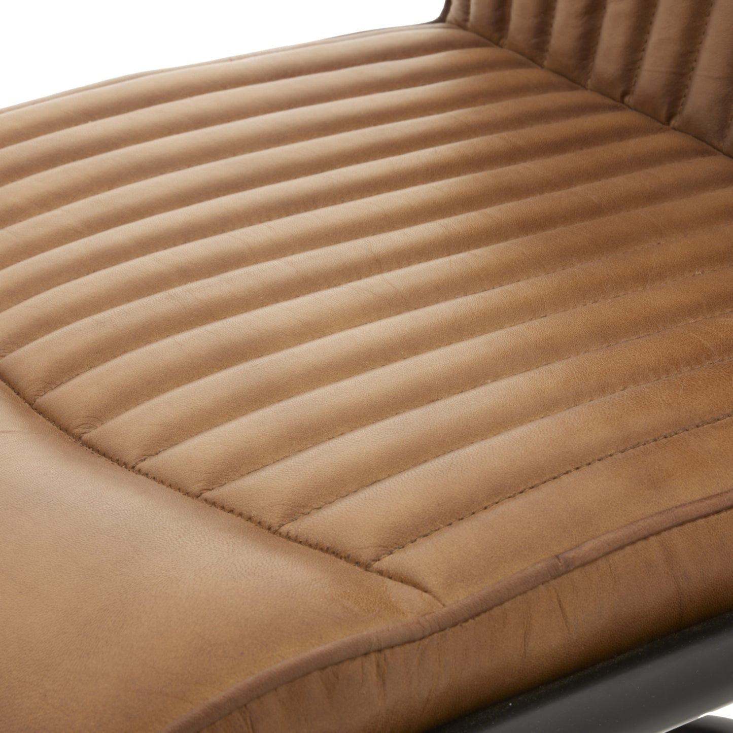 Shop the Billy Leather Dining Chair in supple caramel-hued leather, a statement piece that effortlessly blends classic sophistication with modern industrial design. Shop online today at www.nobleandnook.co.uk