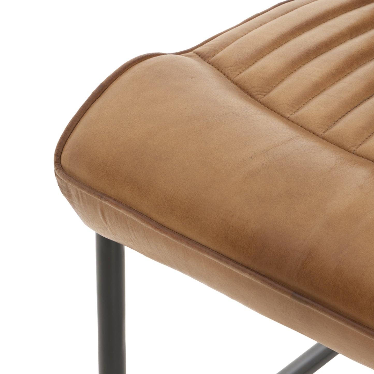 Shop the Billy Leather Dining Chair in supple caramel-hued leather, a statement piece that effortlessly blends classic sophistication with modern industrial design. Shop online today at www.nobleandnook.co.uk