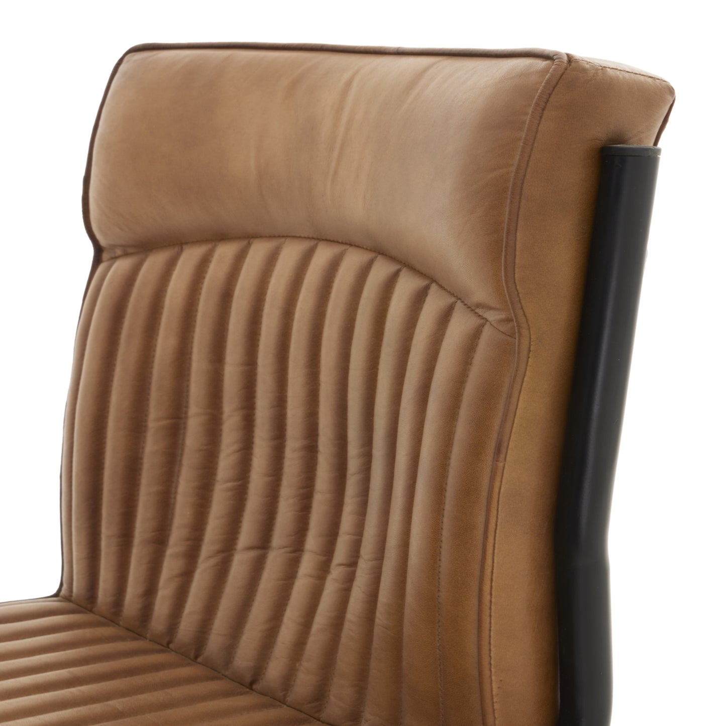 Shop the Billy Leather Dining Chair in supple caramel-hued leather, a statement piece that effortlessly blends classic sophistication with modern industrial design. Shop online today at www.nobleandnook.co.uk