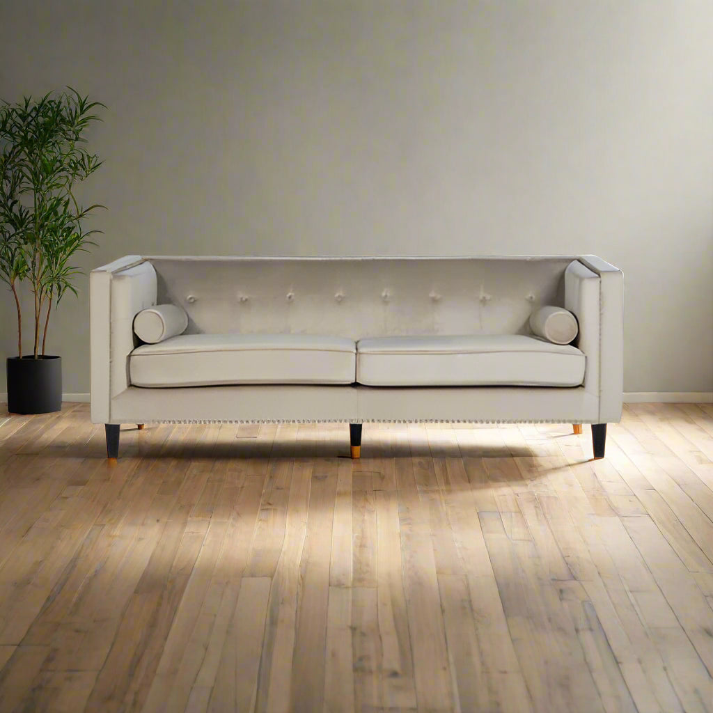 A refined statement piece, the Felisa Sofa is upholstered in neutral mink velvet for a soft, luxurious finish. Perfect for both contemporary and classic interiors. Shop online today at www.nobleandnook.co.uk