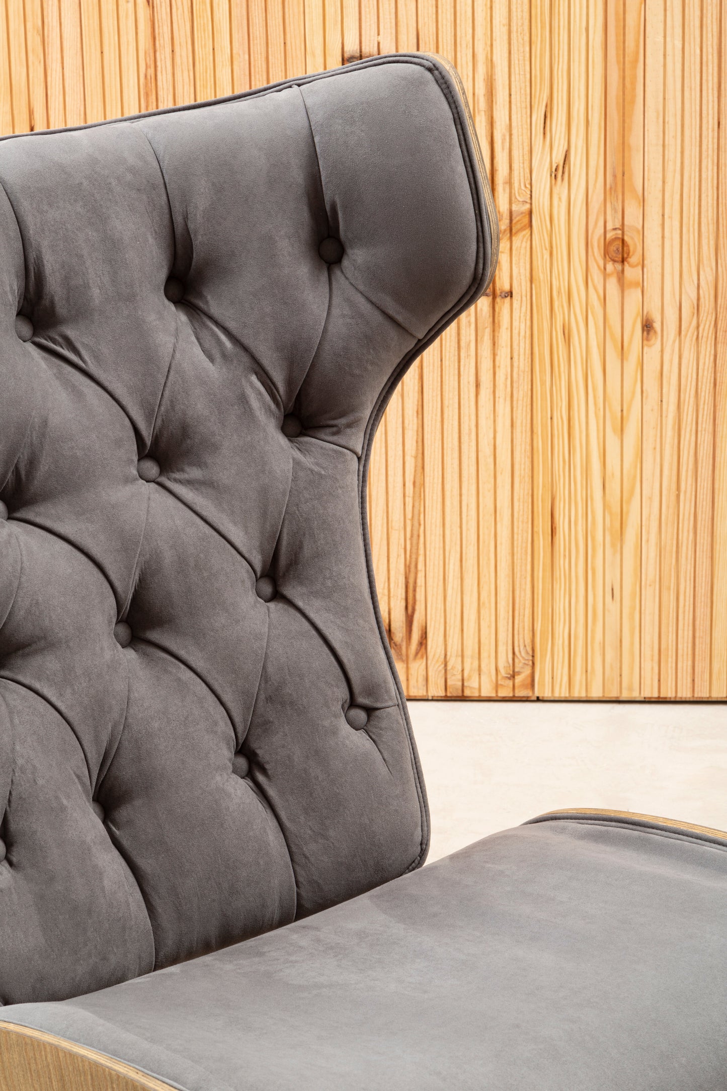 Shop the Dark Grey Velvet Chair with Winged Back, a touch of timeless elegance to any room. A tufted velvet seat, sleek winged design, and sturdy elmwood frame. SHop online today at www.nobleandnook.co.uk