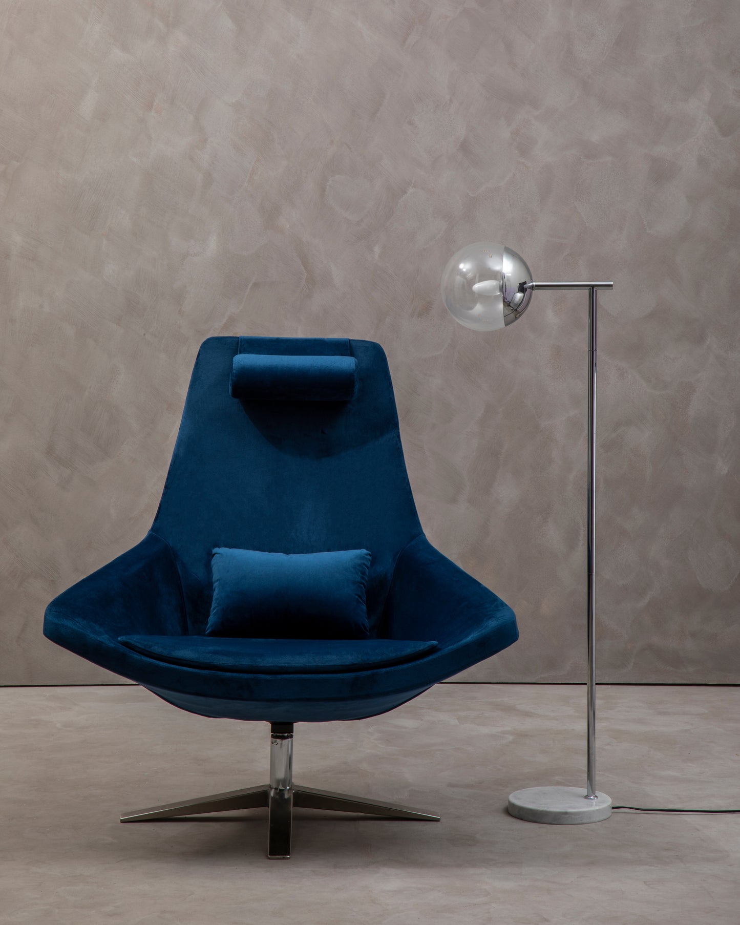 Shop the Arlo Velvet Swivel Chair, a contemporary take on mid-century design, featuring a curved backrest and luxurious velvet upholstery. Shop online today at www.nobleandnook.co.uk