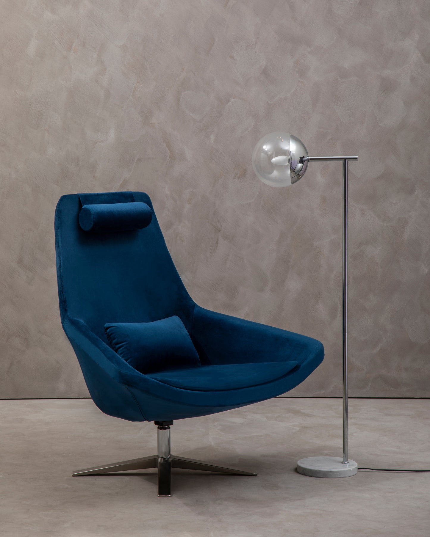 Shop the Arlo Velvet Swivel Chair, a contemporary take on mid-century design, featuring a curved backrest and luxurious velvet upholstery. Shop online today at www.nobleandnook.co.uk