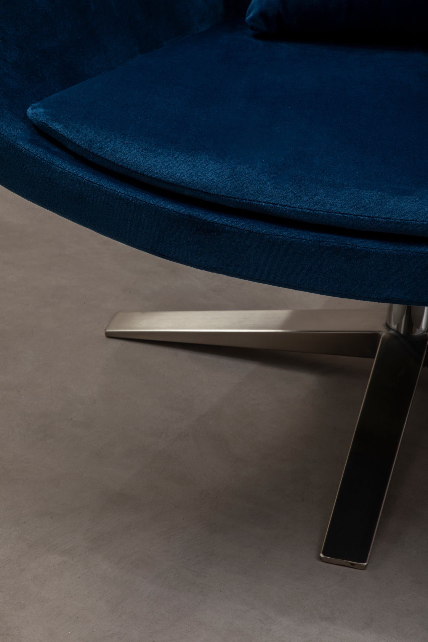 Shop the Arlo Velvet Swivel Chair, a contemporary take on mid-century design, featuring a curved backrest and luxurious velvet upholstery. Shop online today at www.nobleandnook.co.uk
