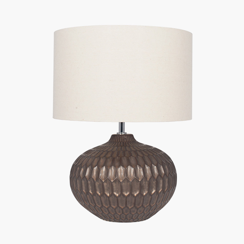 Shop the Cassius Bronze Table Lamp with a layered bronze ceramic base and hand-applied metallic finish. FREE UK MAINLAND DELIVERY. Shop online now at www.nobleandnook.co.uk