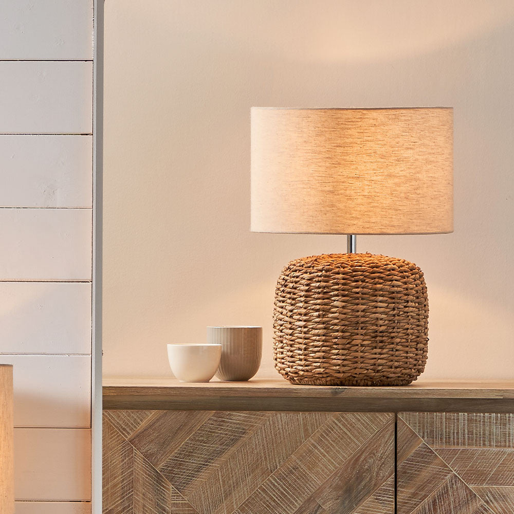 Shop the Acer Natural Woven Small Table Lamp with an ivory textured jute shade, adding both style and texture to your home. Shop online now at www.nobleandnook.co.uk