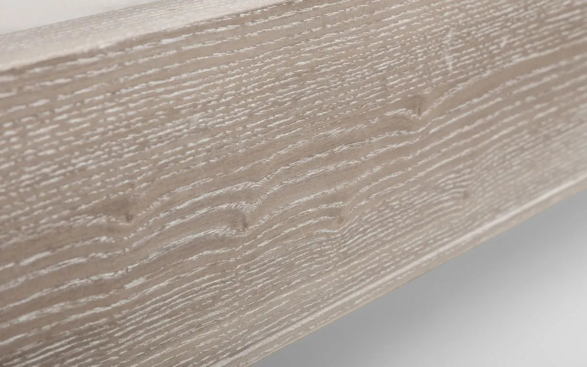 Shop a classic French design. The frame is finished in a limed oak effect, a soft upholstered headboard covered in an oatmeal linen fabric. Shop online today at www.nobleandnook.co.uk