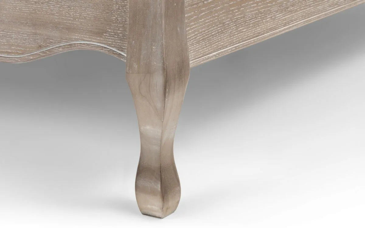 Shop a classic French design. The frame is finished in a limed oak effect, a soft upholstered headboard covered in an oatmeal linen fabric. Shop online today at www.nobleandnook.co.uk
