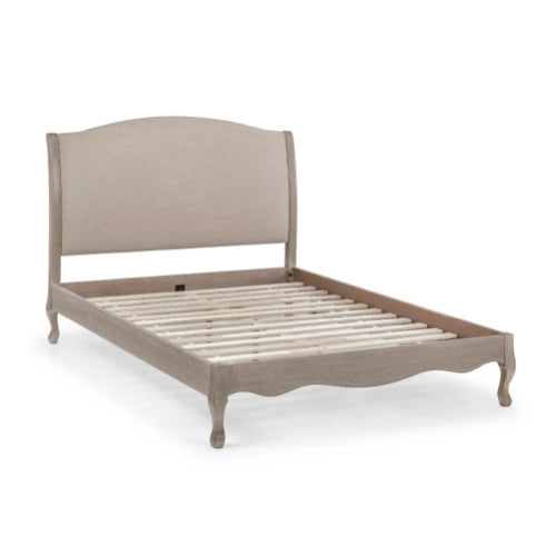 Shop a classic French design. The frame is finished in a limed oak effect, a soft upholstered headboard covered in an oatmeal linen fabric. Shop online today at www.nobleandnook.co.uk