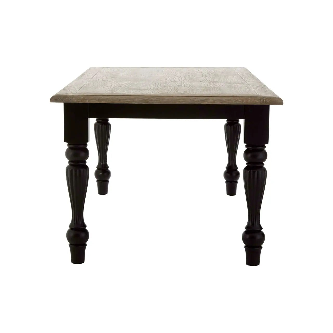 Add timeless sophistication to your dining space with the Belgravia Townhouse dining table, featuring a warm oak wood top and antique black turned birchwood legs. Shop online today at www.nobleandnook.co.uk