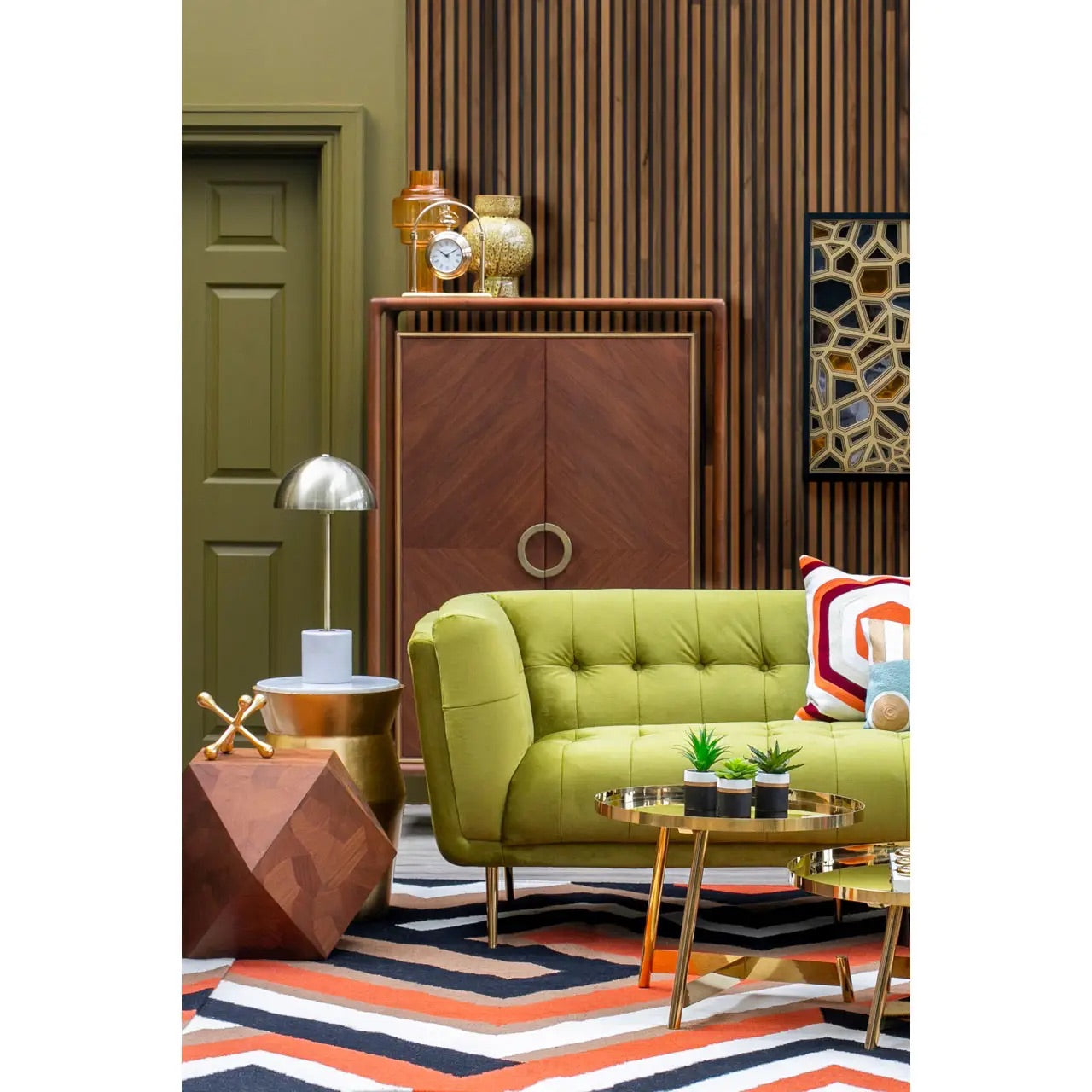 Premium Walnut Wood with elegant brass finishing accents elevate the look with a refined touch. Full Assembled. The two large doors open with three shelves and two drawers. Shop online today at www.nobleandnook.co.uk