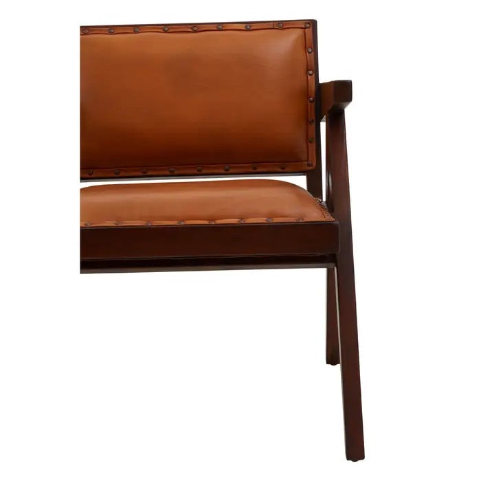 Add refined style to your space with the Andean small armchair. A teak wooden frame, upholstered in soft tan genuine leather and finished with metallic stud detailing. Shop online today at www.nobleandnook.co.uk