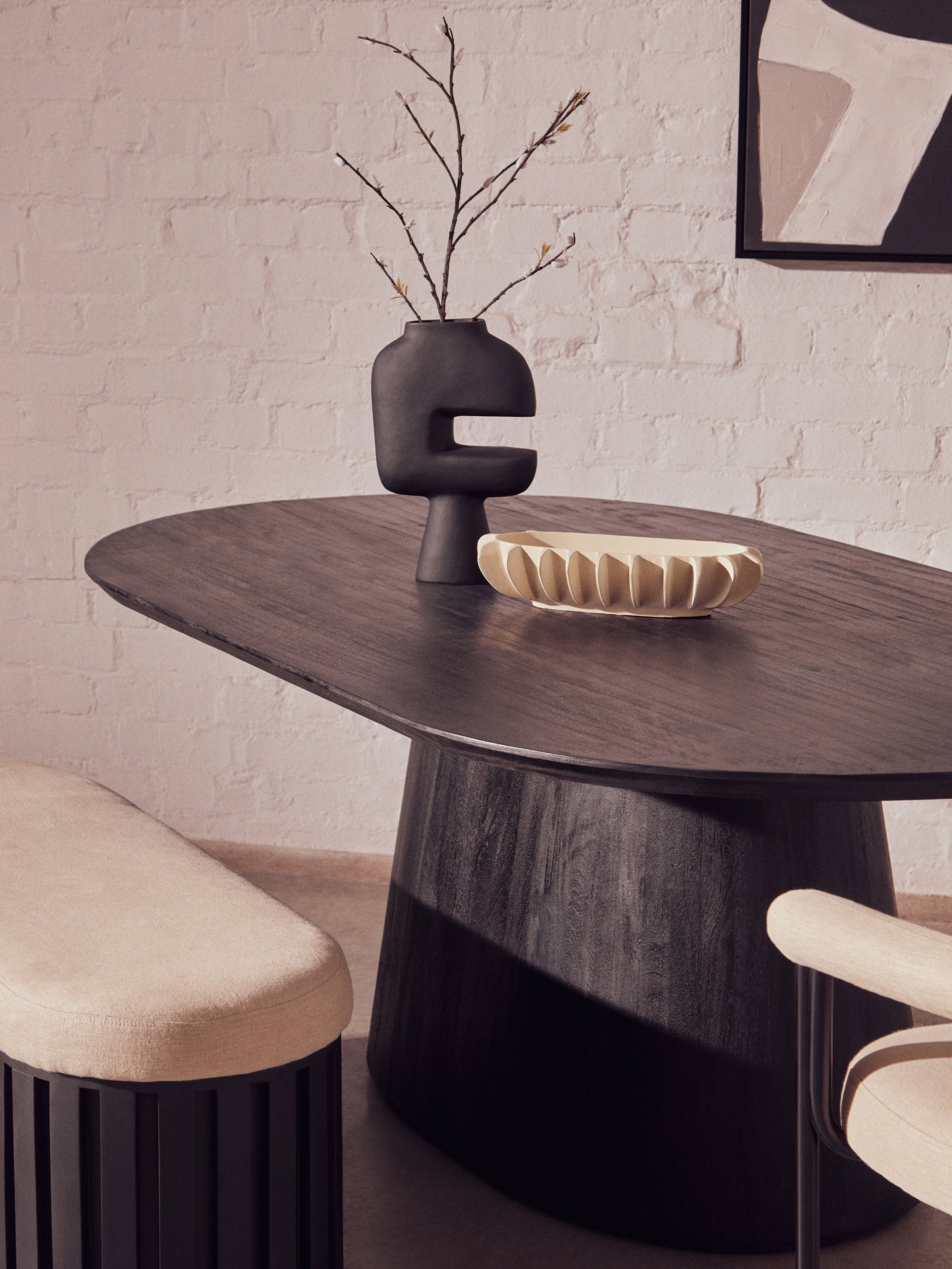 Crafted from eco-friendly mango wood with a sleek black finish, the Perdoba Oval Dining Table combines modern style with sustainability. Free UK Mainland Delivery. Shop online today at www.nobleandnook.co.uk