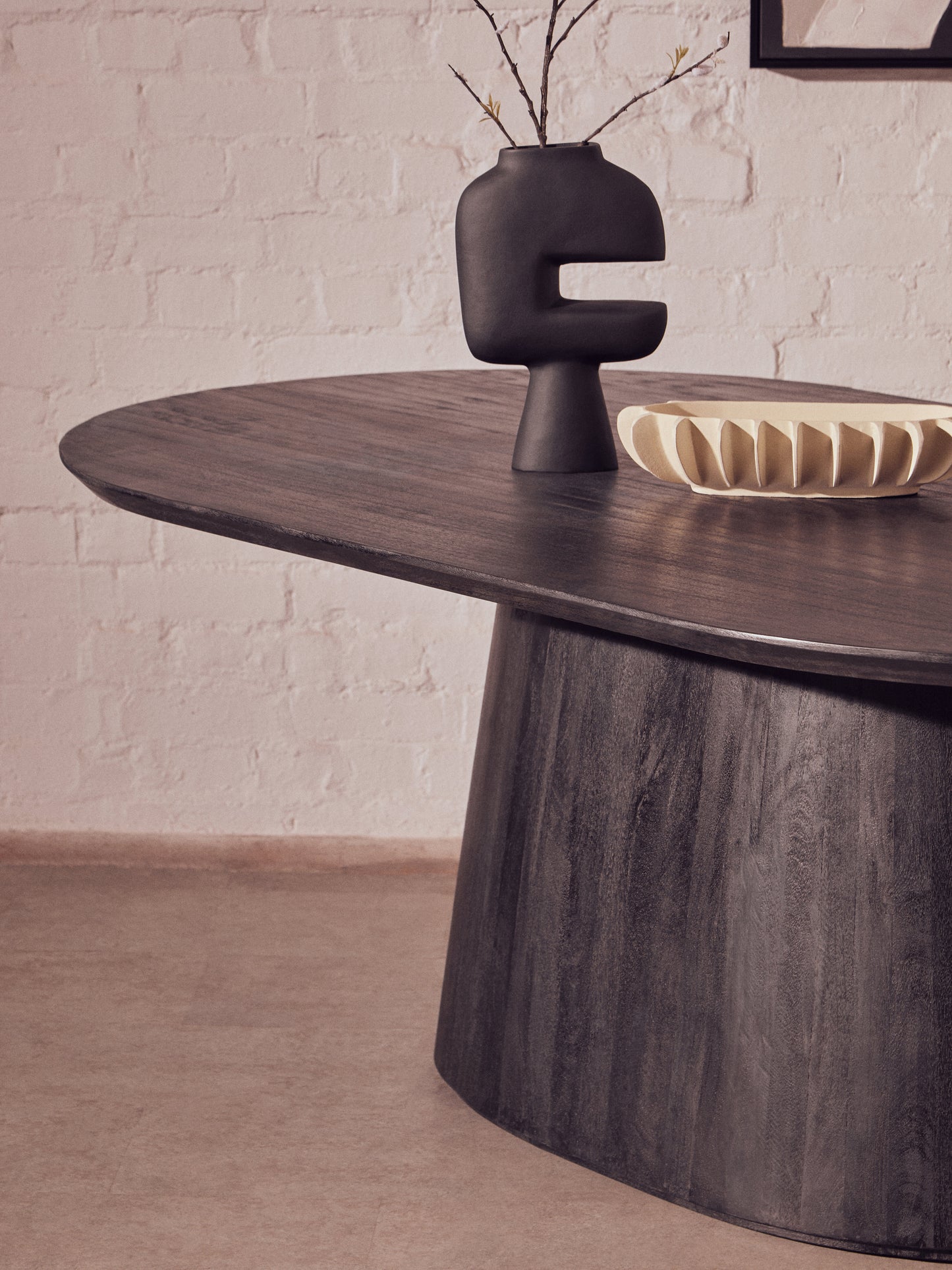 Crafted from eco-friendly mango wood with a sleek black finish, the Perdoba Oval Dining Table combines modern style with sustainability. Free UK Mainland Delivery. Shop online today at www.nobleandnook.co.uk