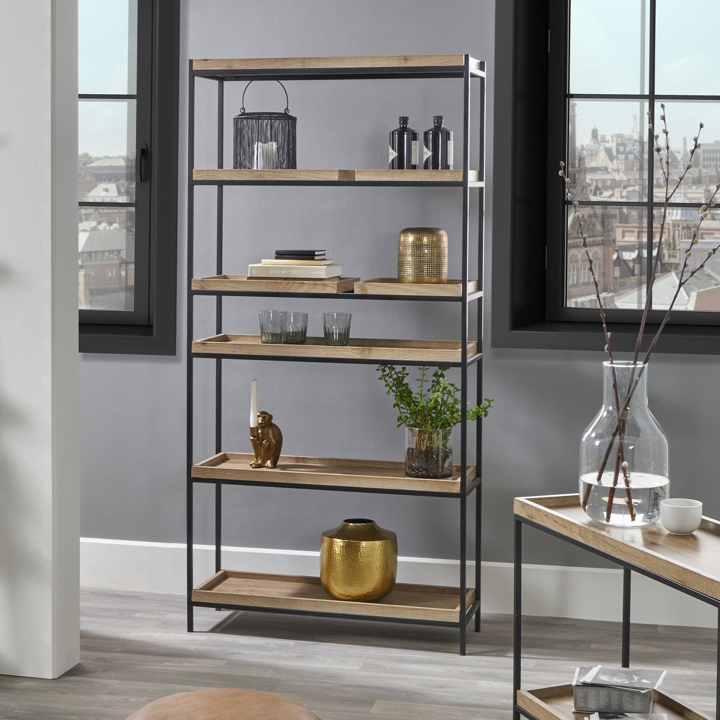 Introduce industrial elegance to your interior with the Gallery 5 Shelf Unit with a matte black metal frame with natural wood veneer shelves. W90xD31xH184cm. Fully Assembled. Available today at www.nobleandnook.co.uk