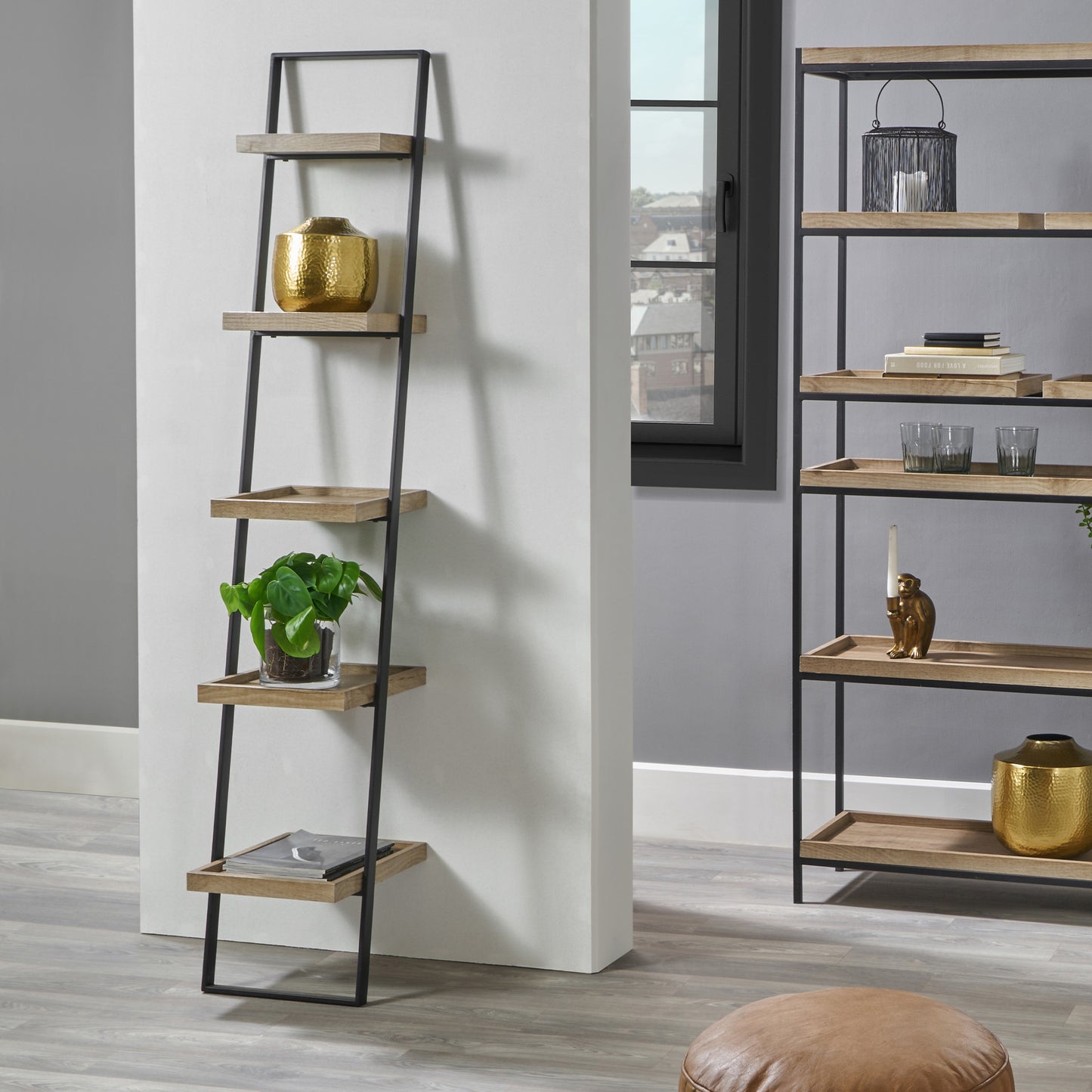 Elevate your home with the Gallery 5 Shelf Ladder Unit. Crafted with a matte black metal frame and natural wood veneer shelves. Dimensions W34xD36xH181cm. Shop online today at www.nobleandnook.co.uk