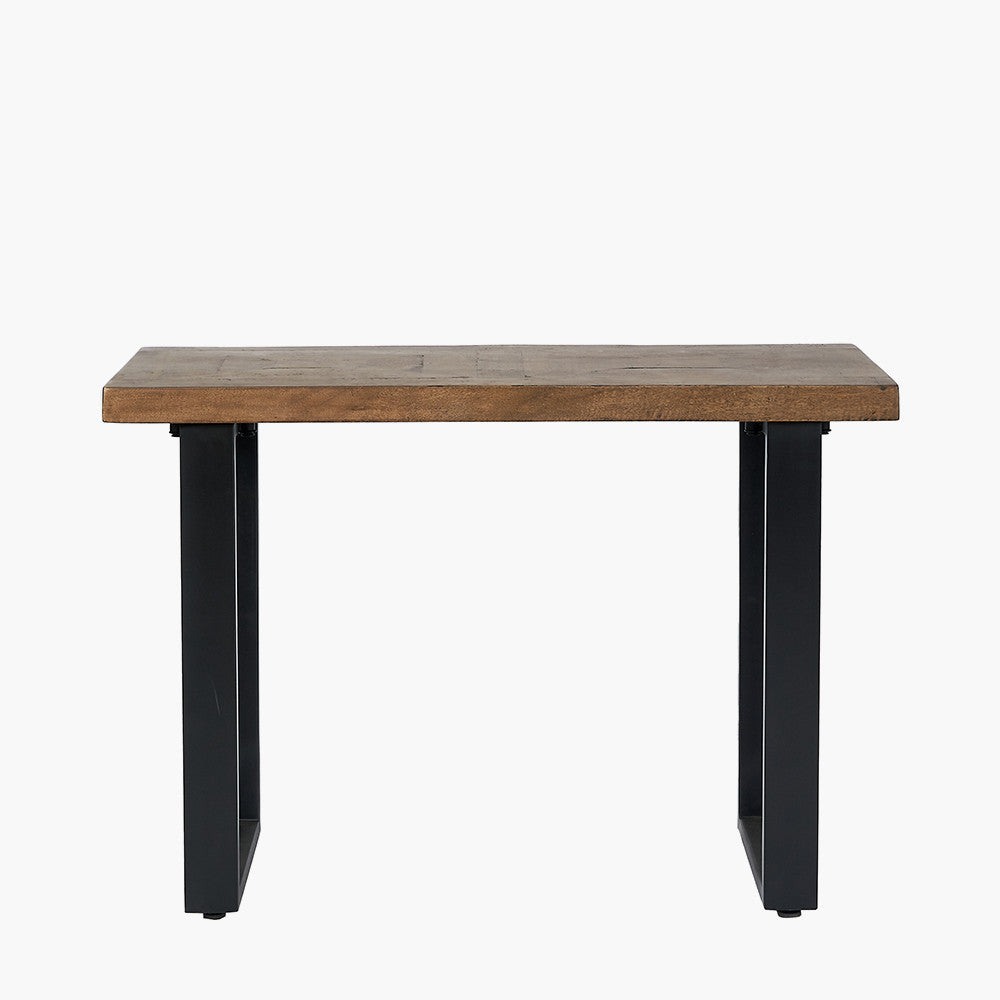 The Pahoja Console Table with an intricate inlaid mango wood top and black black iron legs offering a modern edge, perfect functional accent in any space. Available now at www.nobleandnook.co.uk