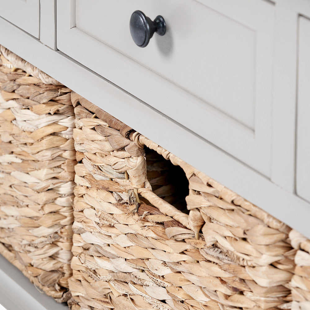 Upgrade your home with this elegant wood and woven storage unit, featuring three wooden drawers and three handwoven banana leaf baskets. Shop online today at www.nobleandnook.co.uk