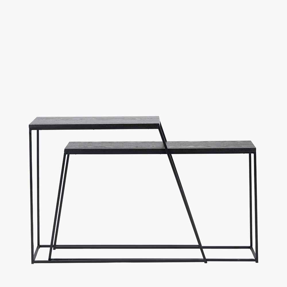 Add bold style and adaptability to your home with the Mashiko Black Ash Veneer and Black Metal Console Tables. Set of two versatile tables with sleek black ash veneer tops. Shop online today at www.nobleandnook.co.uk