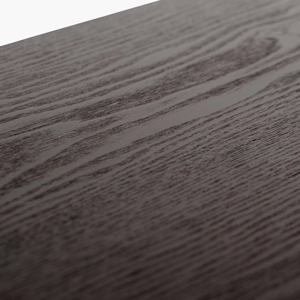 Add bold style and adaptability to your home with the Mashiko Black Ash Veneer and Black Metal Console Tables. Set of two versatile tables with sleek black ash veneer tops. Shop online today at www.nobleandnook.co.uk