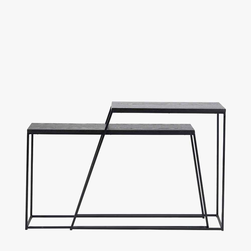 Add bold style and adaptability to your home with the Mashiko Black Ash Veneer and Black Metal Console Tables. Set of two versatile tables with sleek black ash veneer tops. Shop online today at www.nobleandnook.co.uk