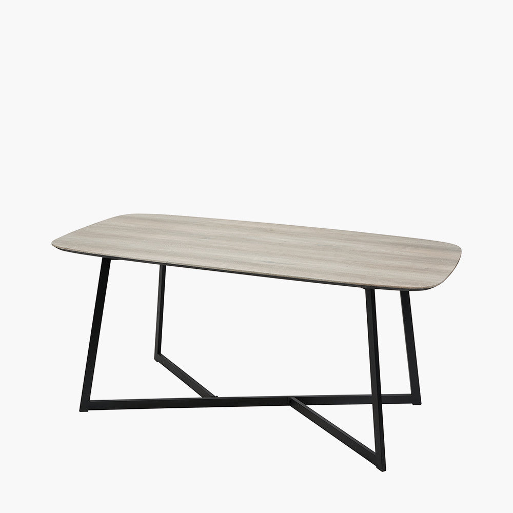 Ukiah Grey Oak Veneer and Black Metal Dining Table, featuring a grey oak veneer top with soft, rounded edges, paired with sturdy black metal legs. W180xD91xH76cm. Available at www.nobelandnook.co.uk