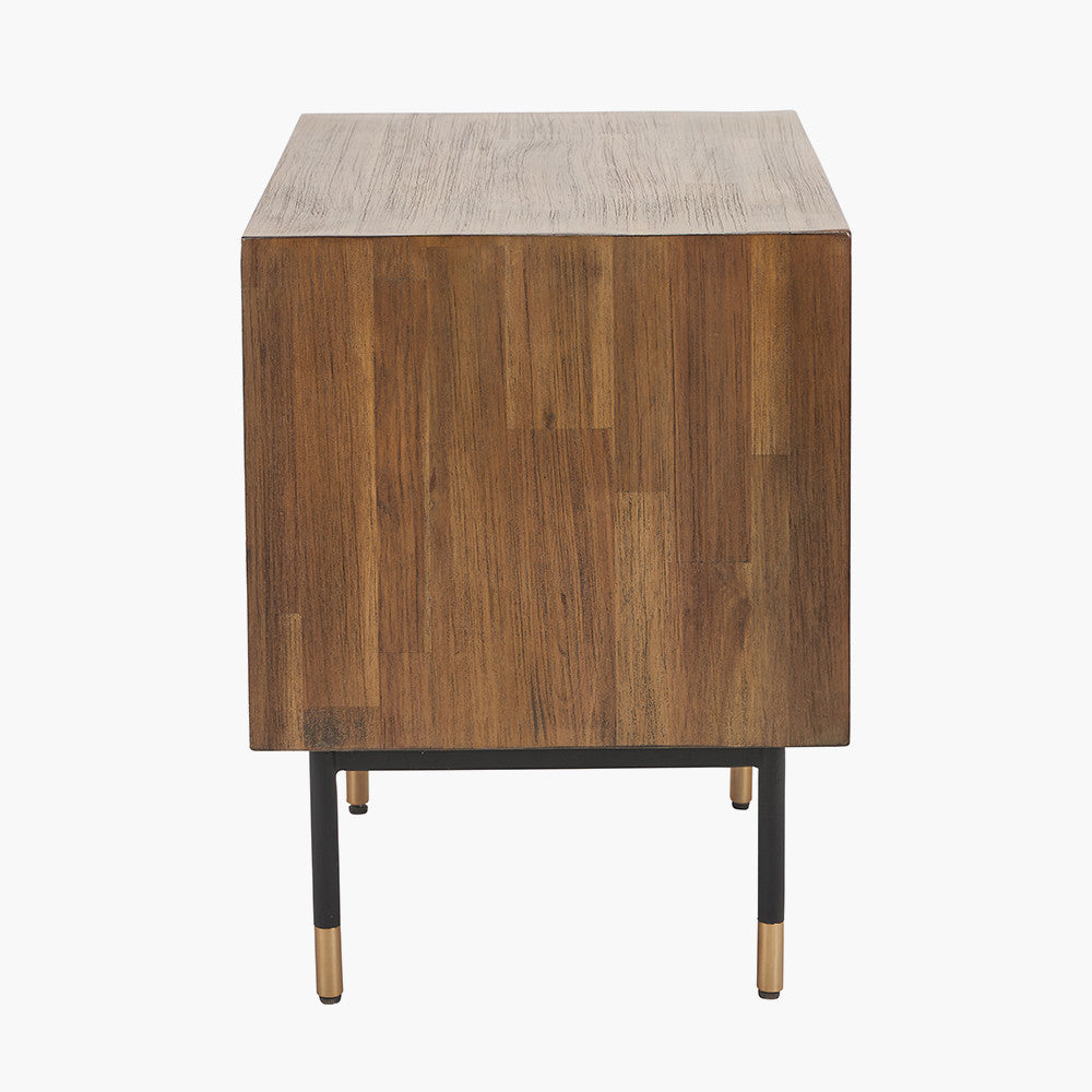 Shop the Arte Bedside Unit in dark brown acacia wood with etched detailing and sleek black metal legs, one drawer and open niche offer ample storage for essentials. Shop online today at www.nobleandnook.co.uk