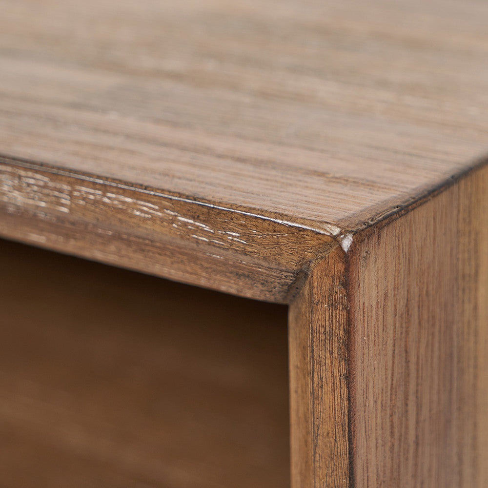 Shop the Arte Bedside Unit in dark brown acacia wood with etched detailing and sleek black metal legs, one drawer and open niche offer ample storage for essentials. Shop online today at www.nobleandnook.co.uk